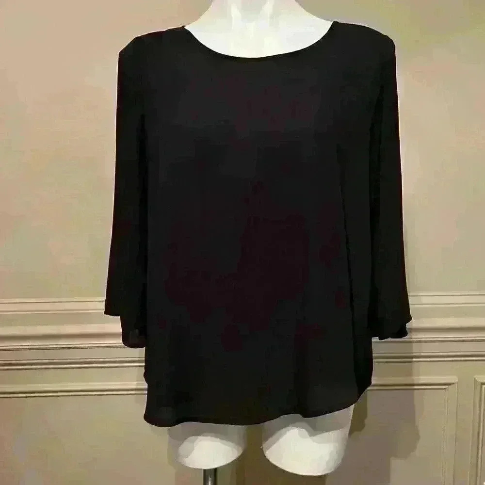 Fun and flowy shirt size Small/Medium